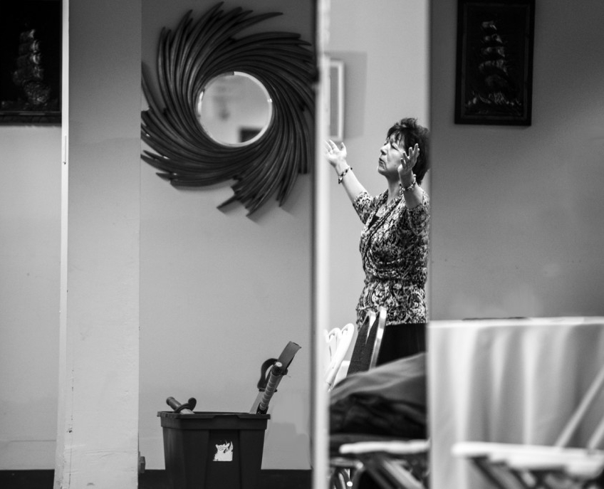 A Detroit resident prays in a worship center in downtown Detroit.